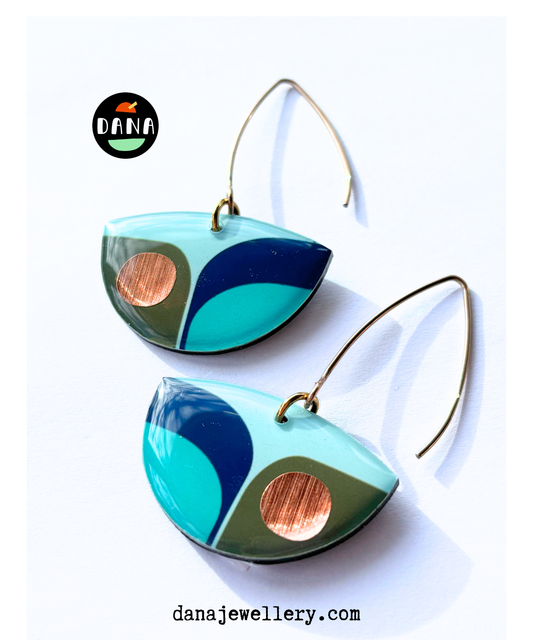 BEA in navy blue, olive green, light teal with a warm pop of copper