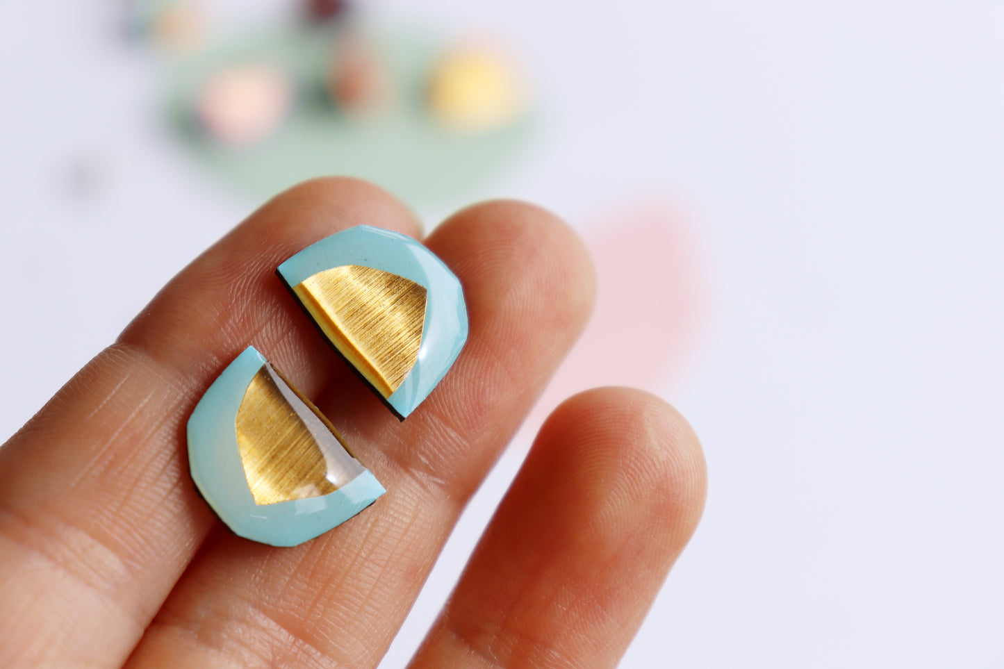 eco chic resin stud earrings in light blue and gold / upcycled vinyl record