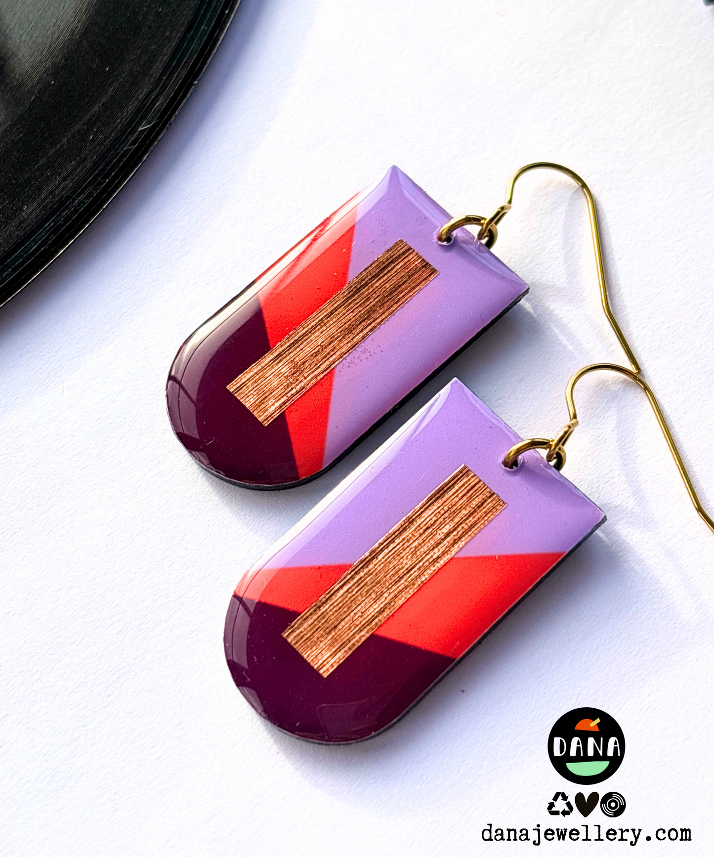 NINA in lilac, deep orange, plum, and copper