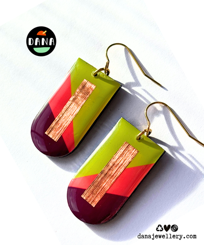 NINA in lime green, deep orange, plum, and copper