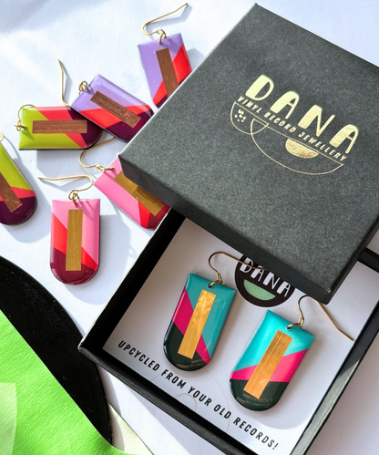 NINA in turquoise, fuchsia, deep khaki, and gold