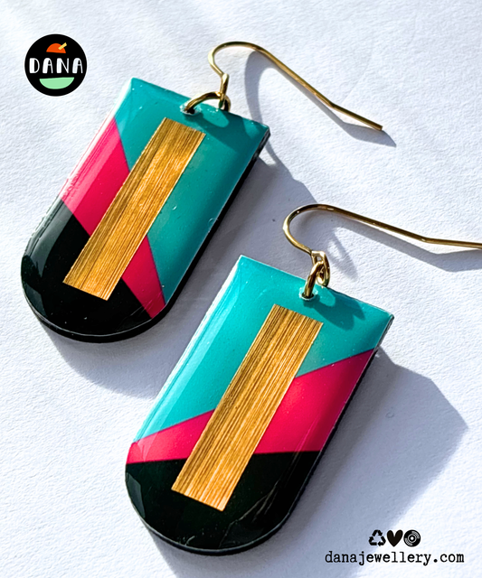 NINA in turquoise, fuchsia, deep khaki, and gold