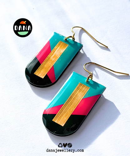 NINA in turquoise, fuchsia, deep khaki, and gold