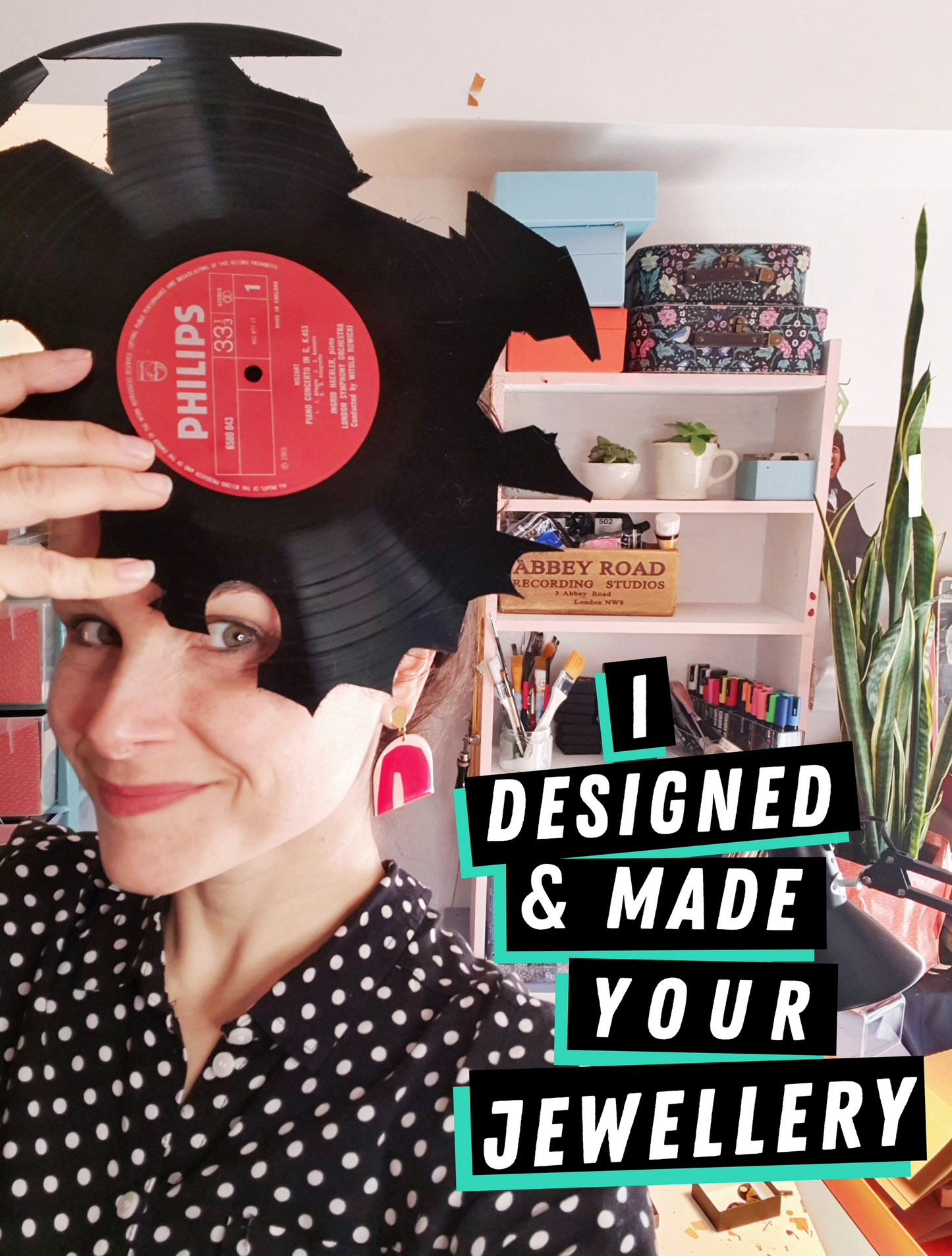 Big bold black teardrop vinyl record earrings by Dana Jewellery